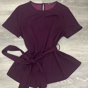 Beautiful purple peplum top with tie at waist